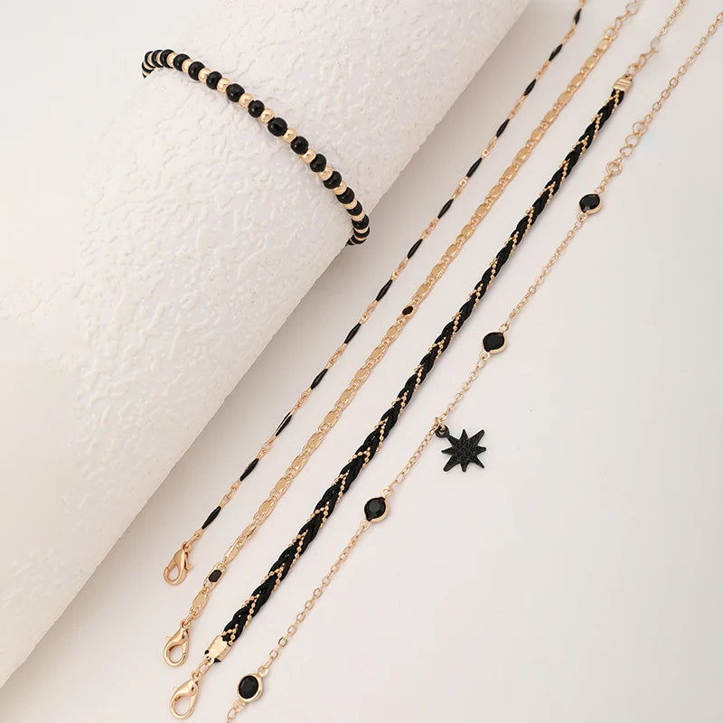 Bohemian Woven Rope Fußkettchen-Set mit geometrischen schwarzen Perlen und Tropfenöl