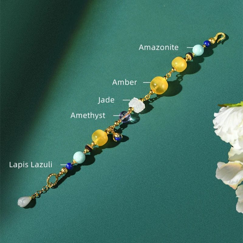 Bernsteinfarbenes Goldarmband mit mehreren Edelsteinen