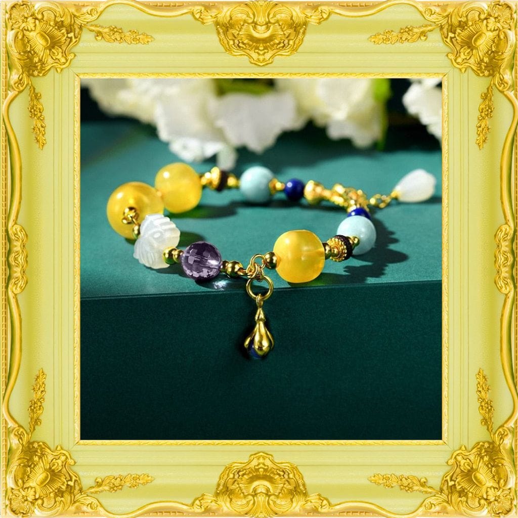 Bernsteinfarbenes Goldarmband mit mehreren Edelsteinen