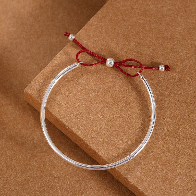 Chavri-Armband aus 925er-Sterlingsilber mit roter Schnur und heilendem Knoten
