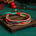 Chavri Tibet Handgefertigtes, regenbogenfarbenes, geflochtenes Schutzarmband