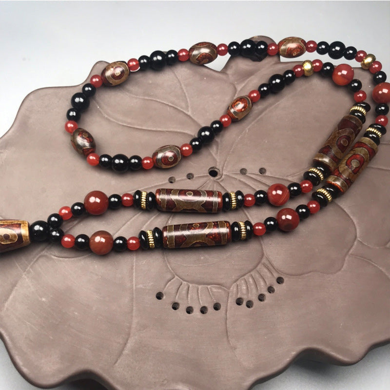 Chavri Nine-Eye Dzi Bead Red Agate Wealth Health Halskette