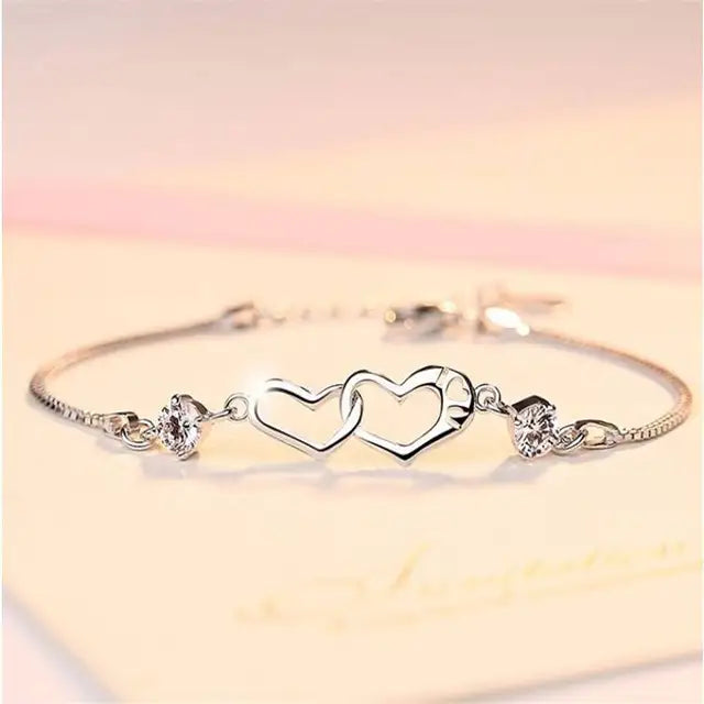 Elegantes Armband mit weißem und violettem Kristall für Damen