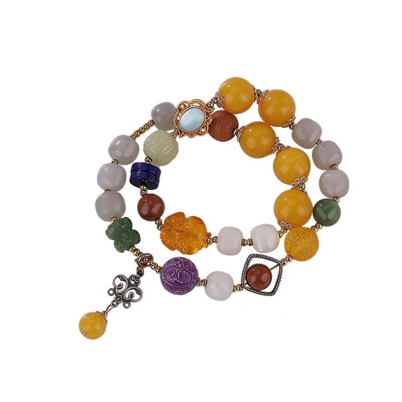 Armband mit mehreren Edelsteinen und doppelten Perlen