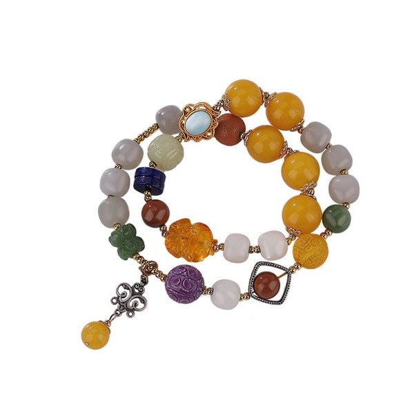 Armband mit mehreren Edelsteinen und doppelten Perlen