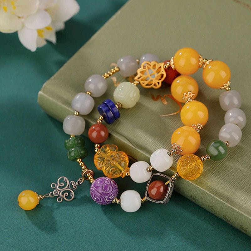 Armband mit mehreren Edelsteinen und doppelten Perlen