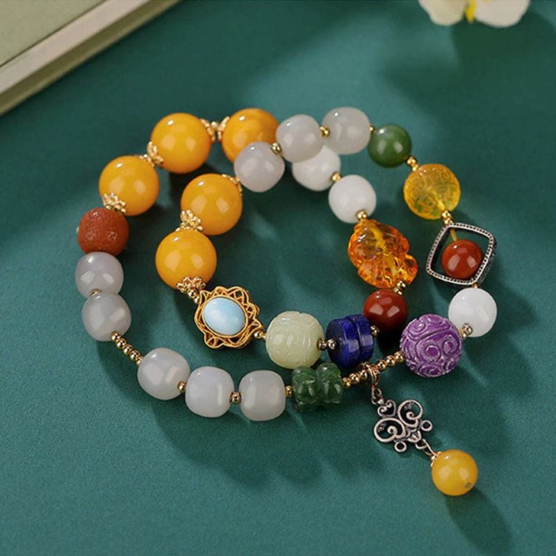 Armband mit mehreren Edelsteinen und doppelten Perlen