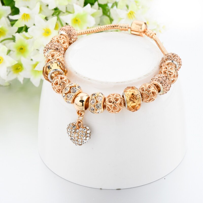 Kristallherzcharm Goldperlen Armband
